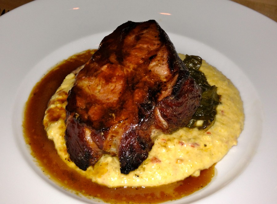 Pork chop severely undercooked.