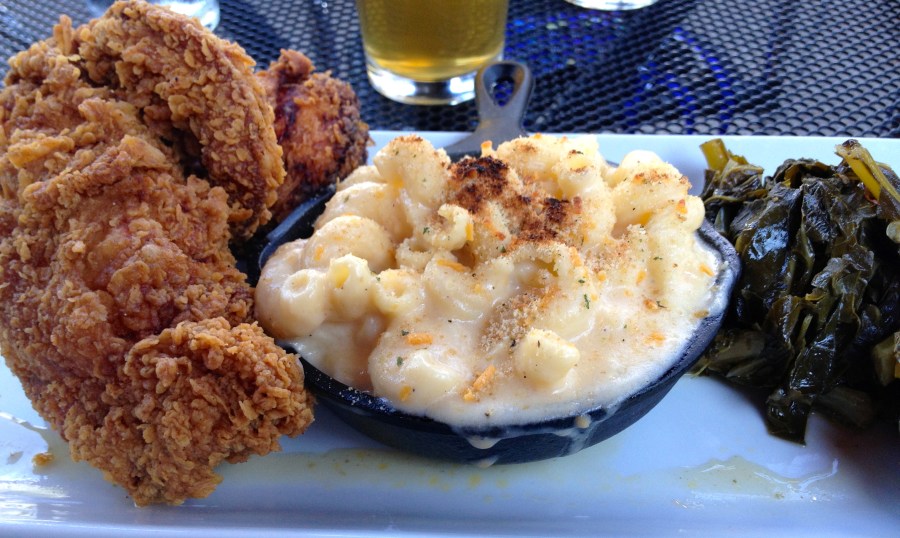 Fried chicken, mac and cheese, and greens.  Southern comfort food.