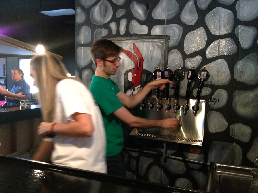 Volunteers pour our beers.
